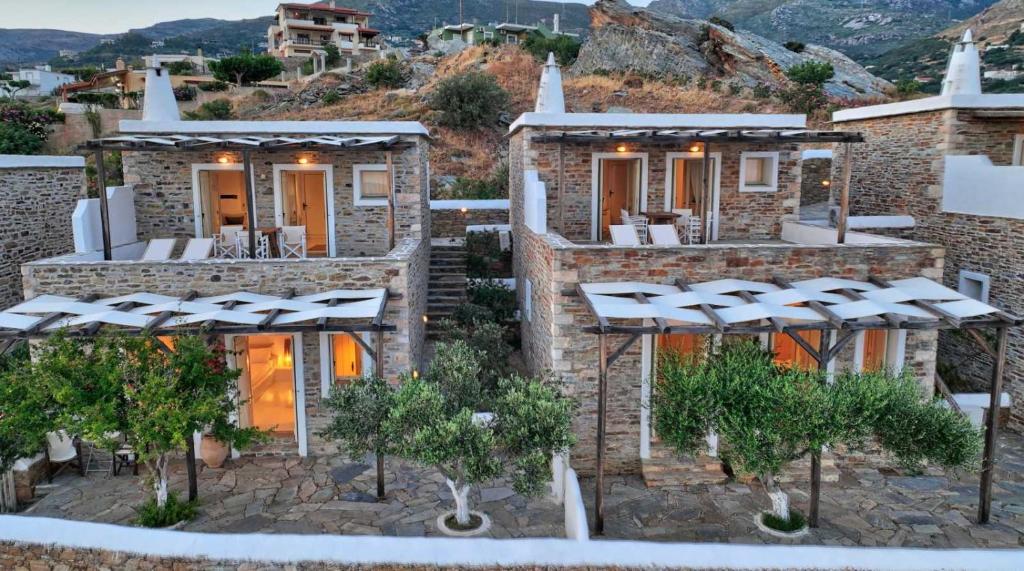 a villa with a view of the mountains at Lithos Villas in Karistos