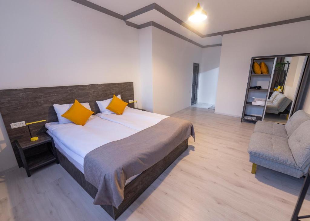 Postel nebo postele na pokoji v ubytování Popock Goris