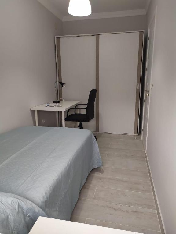 Posteľ alebo postele v izbe v ubytovaní Precioso piso 3 dormitorios, aire acondicionado Jerez de la Frontera
