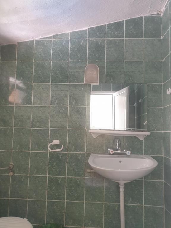 Koupelna v ubytování Hotel Maria