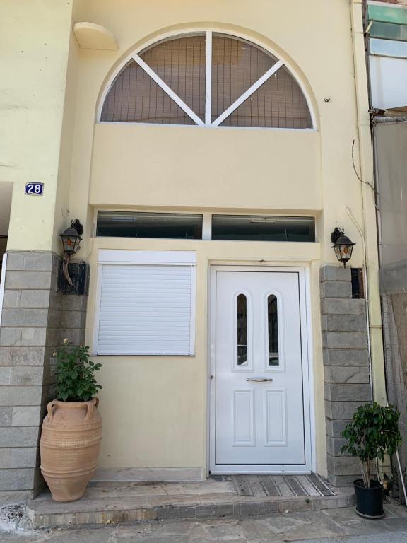 The facade or entrance of Melinas Maisonette