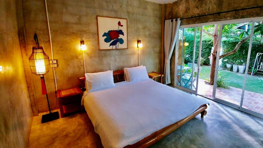 Postel nebo postele na pokoji v ubytování Namaste resort