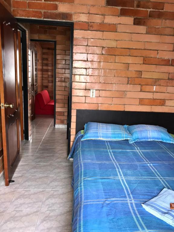 Alojamiento villa hermosa - Three-Bedroom House