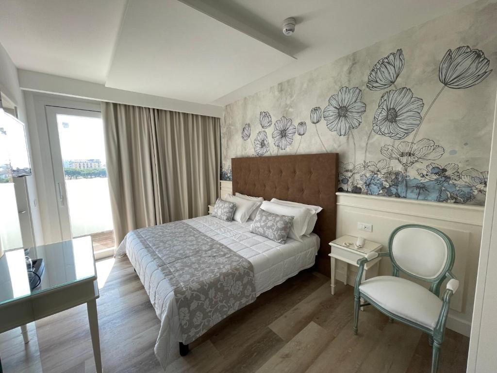 Postel nebo postele na pokoji v ubytování Park Hotel Cellini