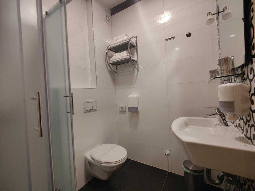 Koupelna v ubytování Boutique Hotel Castello Gulich