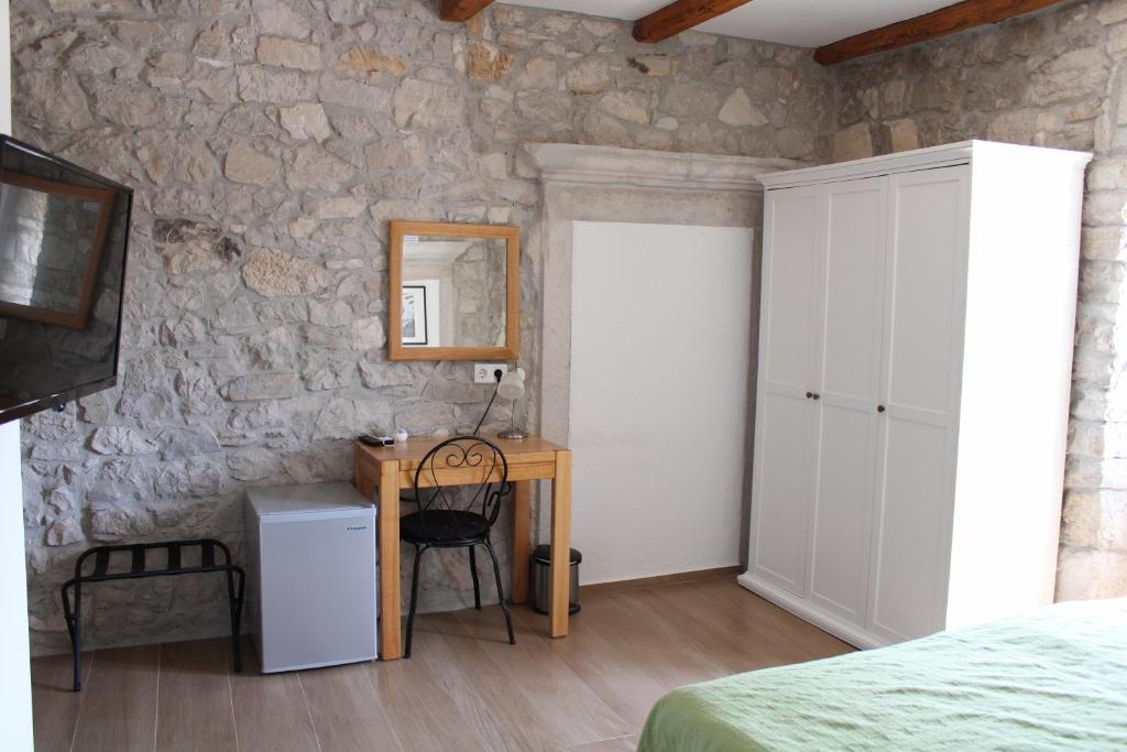 Postel nebo postele na pokoji v ubytování Boutique Hotel Castello Gulich