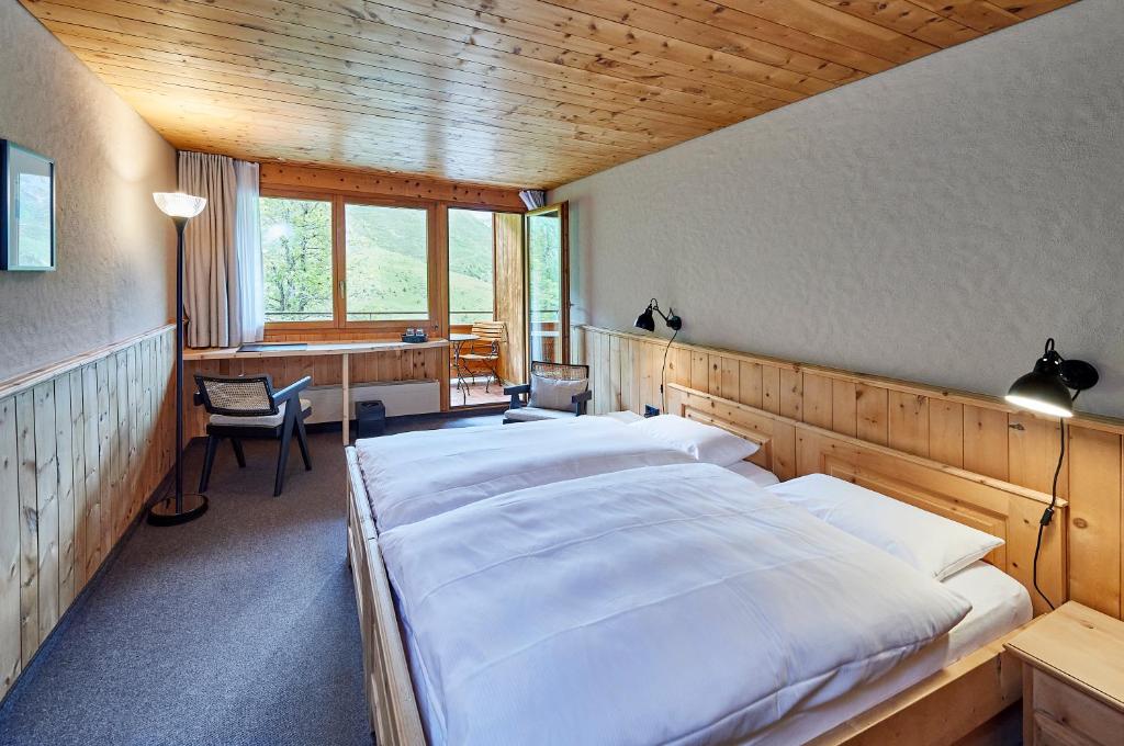 Postel nebo postele na pokoji v ubytování Hotel Stoffel - adults only