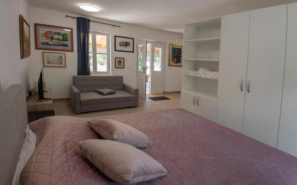Postel nebo postele na pokoji v ubytování Studio apartman ROZA