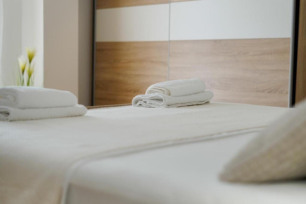 Postel nebo postele na pokoji v ubytování Aurora Apartment Zadar