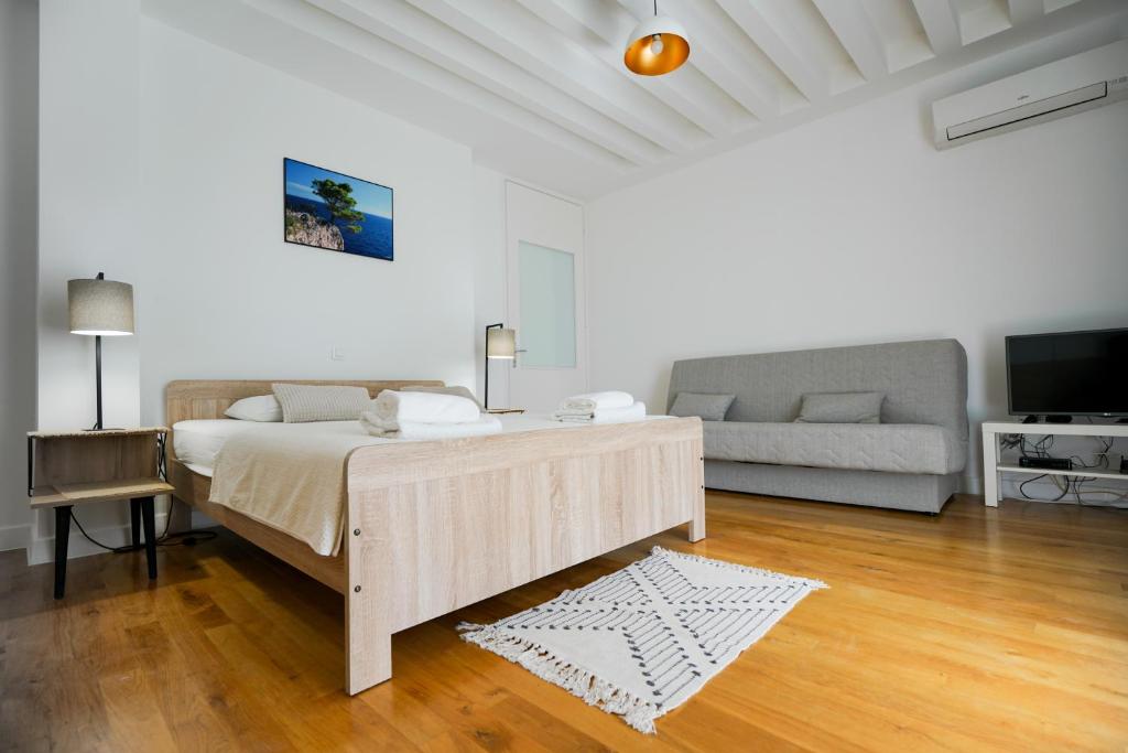 Postel nebo postele na pokoji v ubytování Aurora Apartment Zadar