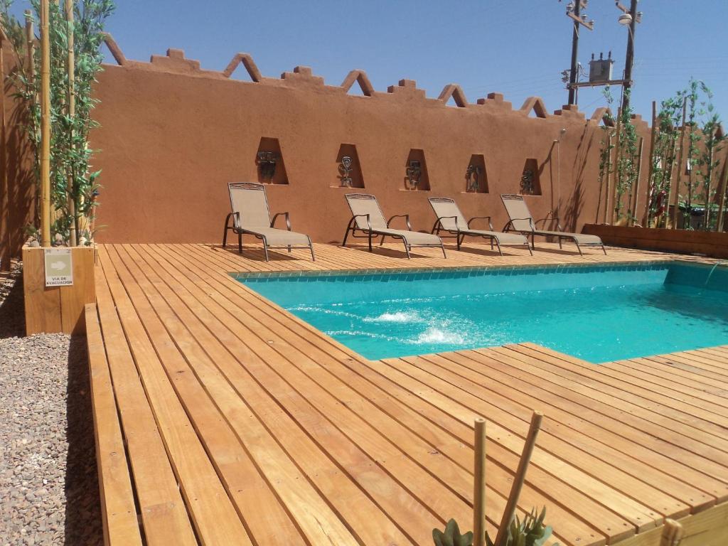 Bazén v ubytování Hoteles Pueblo de Tierra nebo v jeho okolí