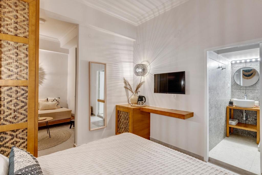 Postel nebo postele na pokoji v ubytování Nomadic Cozy Rooms