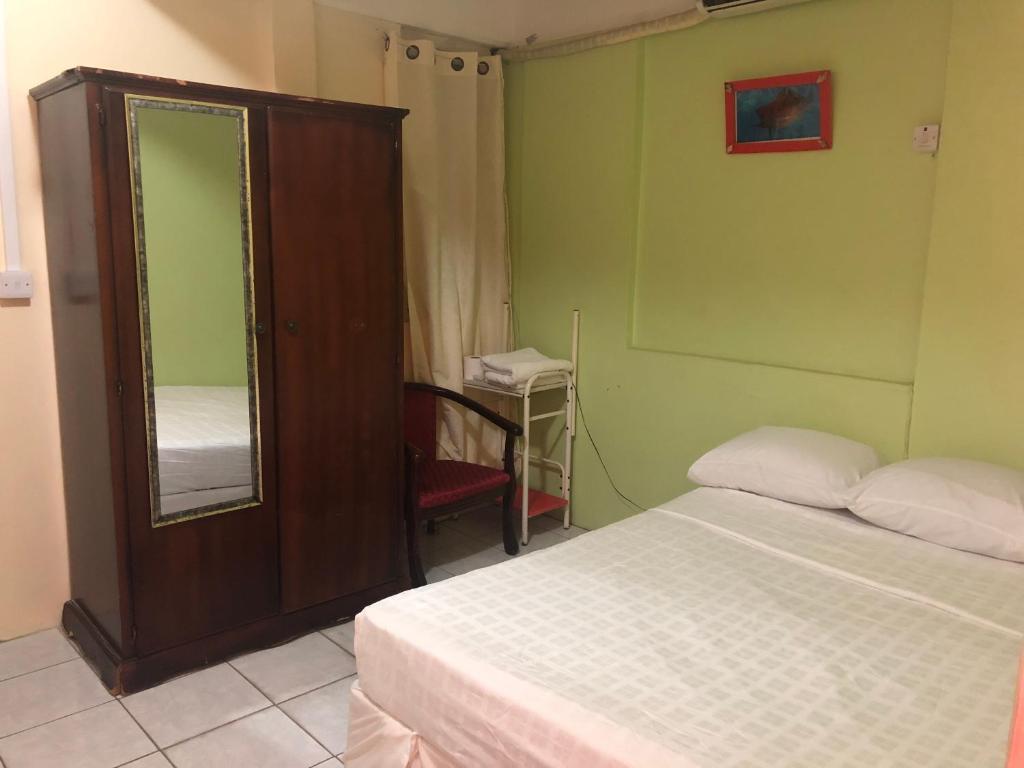 Postel nebo postele na pokoji v ubytování Sea World Vacation Home