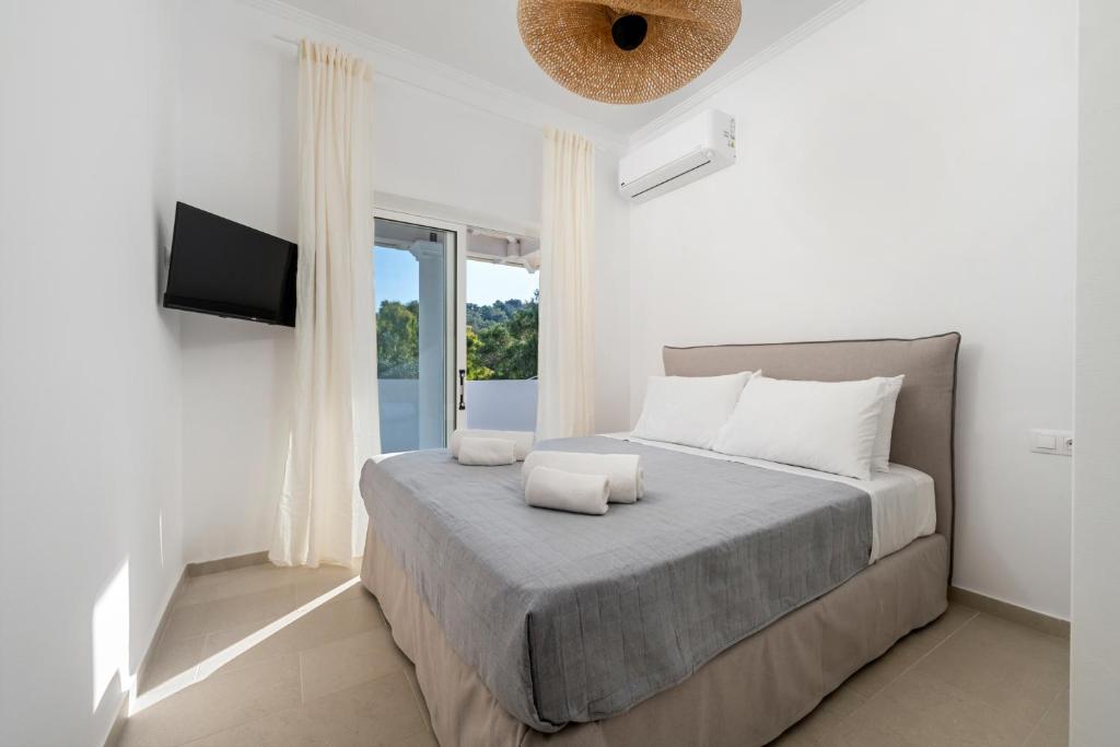 Postel nebo postele na pokoji v ubytování Playia Villas III