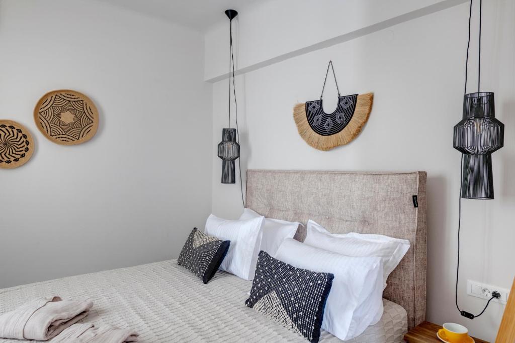 Postel nebo postele na pokoji v ubytování Nomadic Cozy Rooms