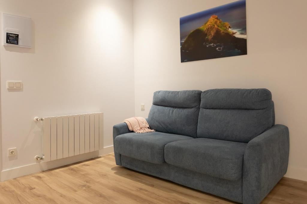 A seating area at APARTAMENTOS ARRIET