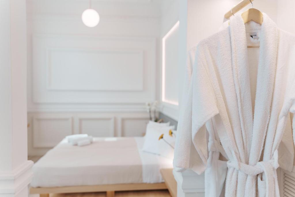 Posteľ alebo postele v izbe v ubytovaní Agora Athens Suites