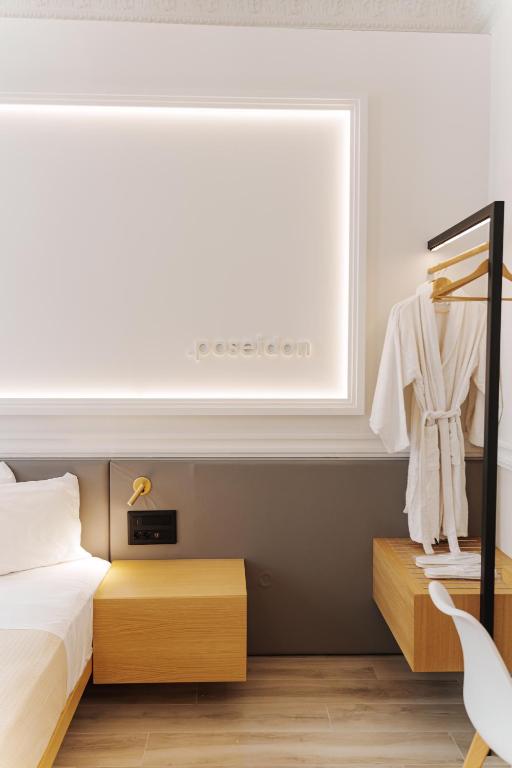 Posteľ alebo postele v izbe v ubytovaní Agora Athens Suites