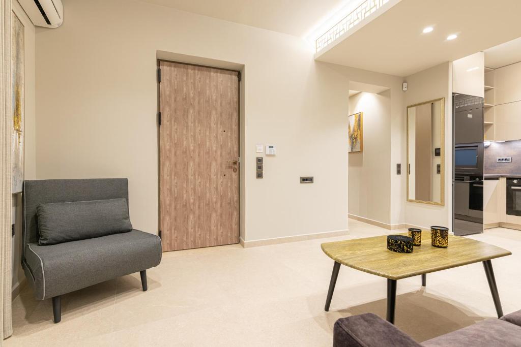 Posedenie v ubytovaní Vedi Town Luxury Apartment
