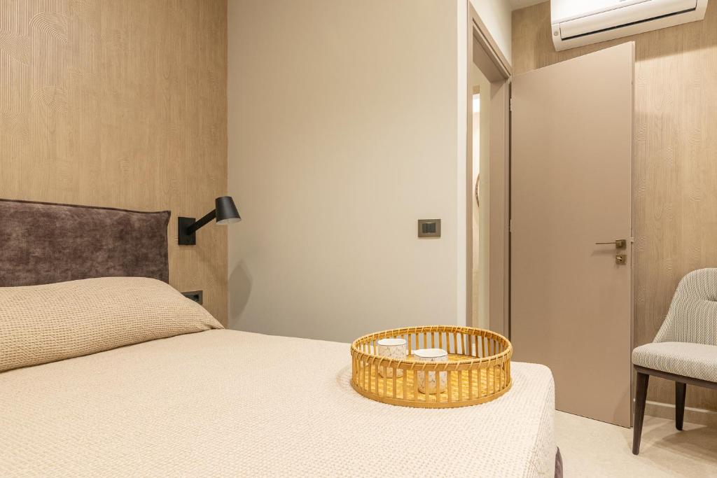 Posteľ alebo postele v izbe v ubytovaní Vedi Town Luxury Apartment