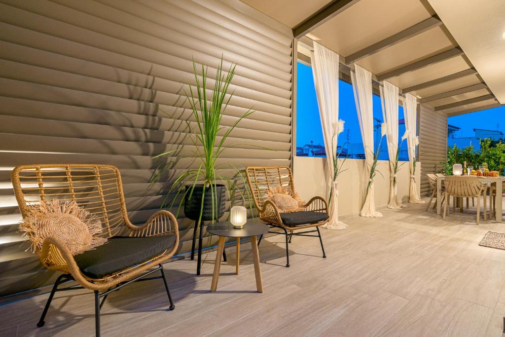 Posedenie v ubytovaní Vedi Town Luxury Apartment