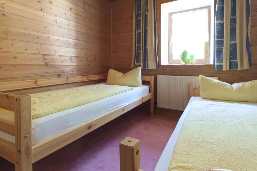 Postel nebo postele na pokoji v ubytování Gasthof zur Post - Hauserwirt