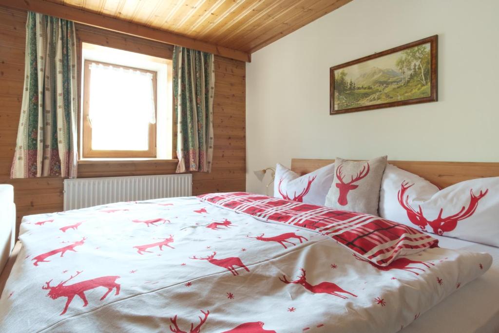 Postel nebo postele na pokoji v ubytování Gasthof zur Post - Hauserwirt