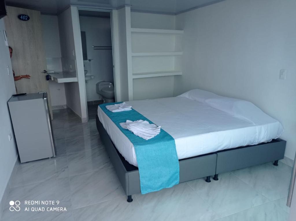 Postel nebo postele na pokoji v ubytování Sky view hotel tolu