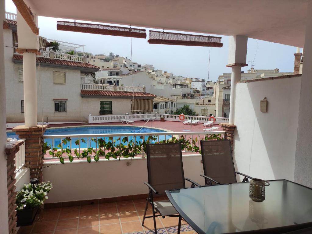 Swimmingpoolen hos eller tæt på Apartamento Oasis La Herradura