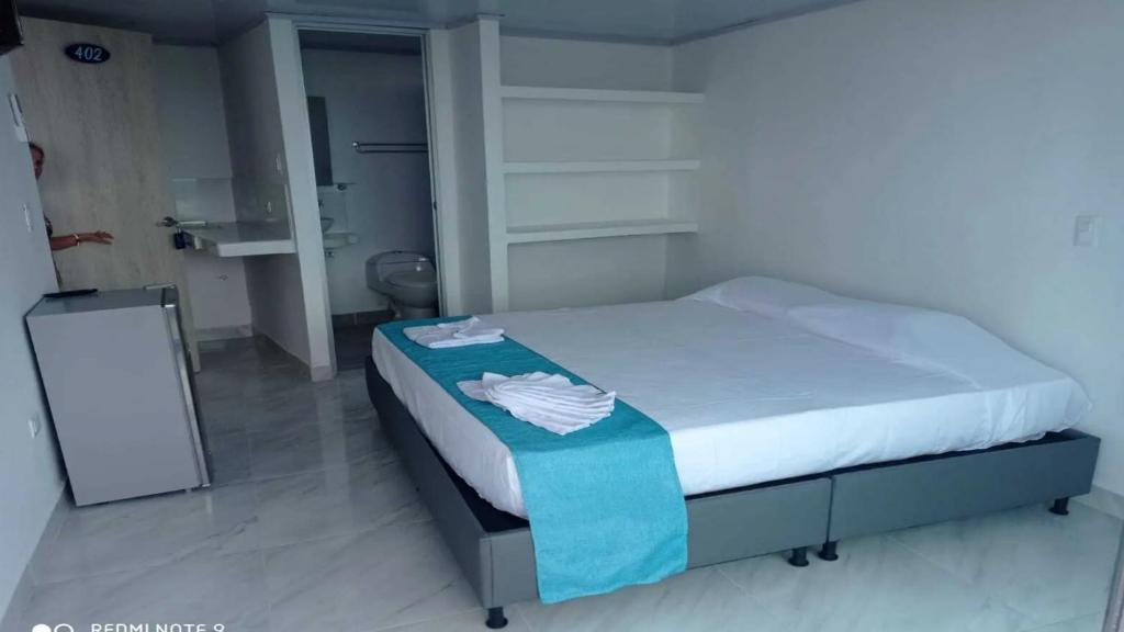 Postel nebo postele na pokoji v ubytování Sky view hotel tolu