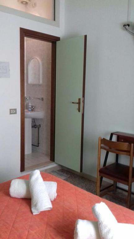 Postel nebo postele na pokoji v ubytování Hotel Acapulco sul mare