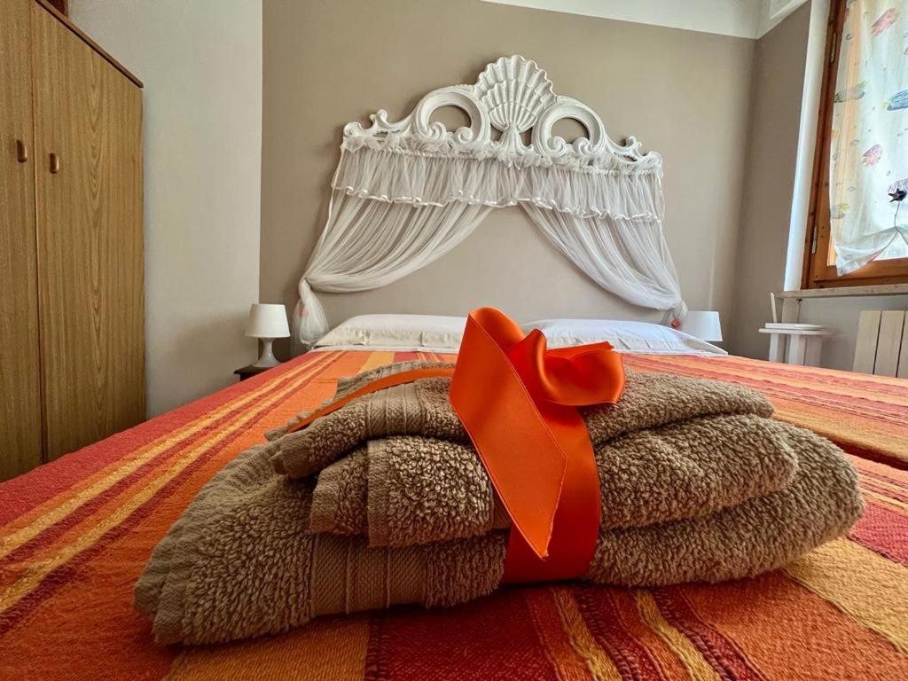 Łóżko lub łóżka w pokoju w obiekcie villino Morena