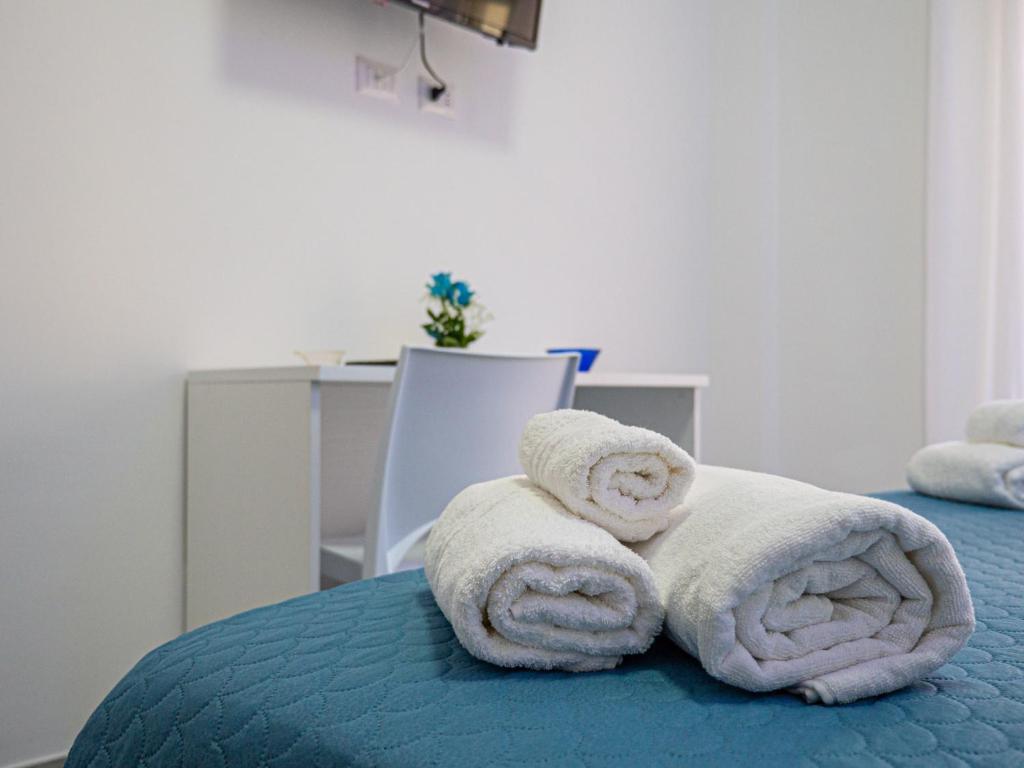 Postel nebo postele na pokoji v ubytování biRose B&B Affittacamere