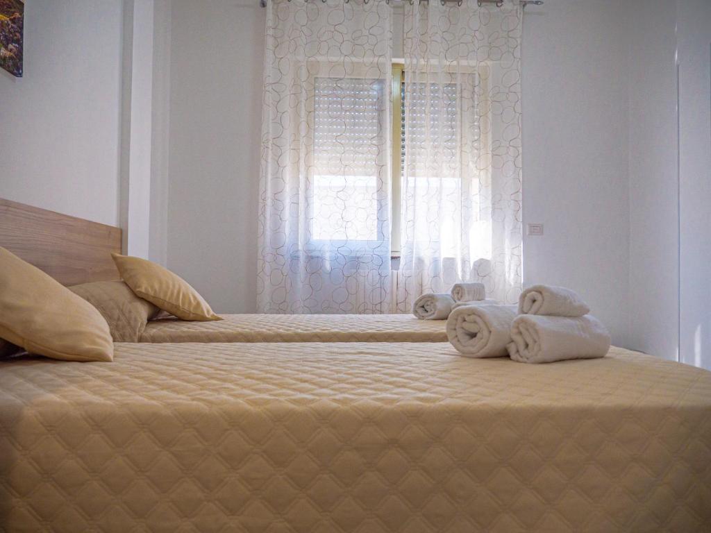 Postel nebo postele na pokoji v ubytování biRose B&B Affittacamere