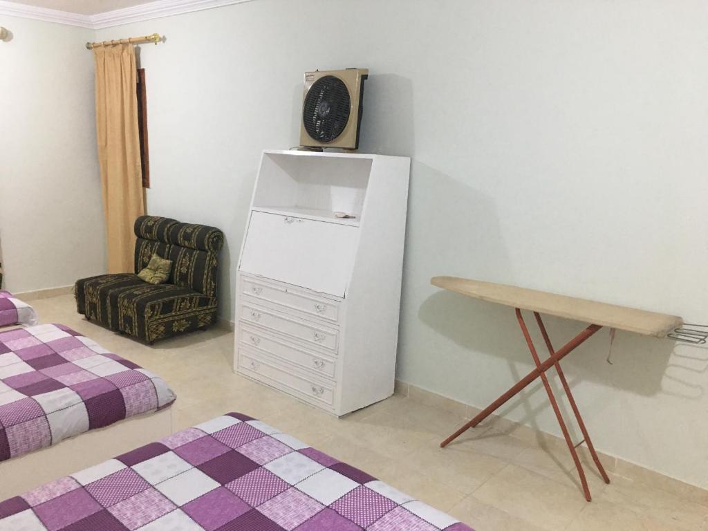 Postel nebo postele na pokoji v ubytování El Kasr Marsa Matruh