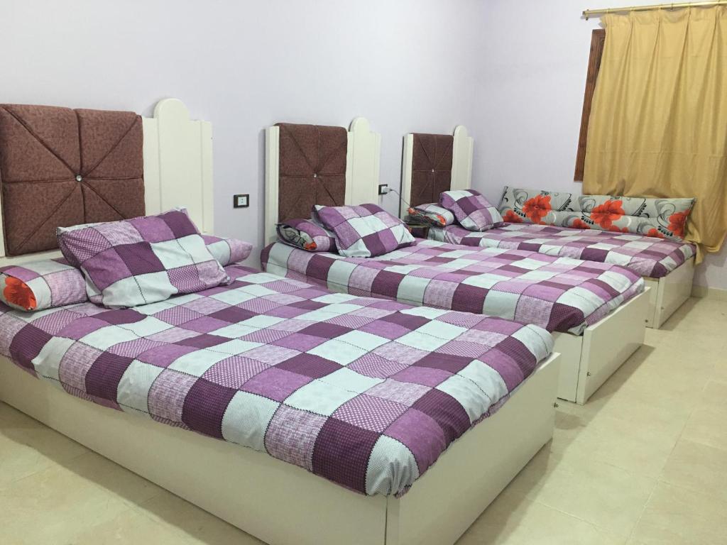 Postel nebo postele na pokoji v ubytování El Kasr Marsa Matruh