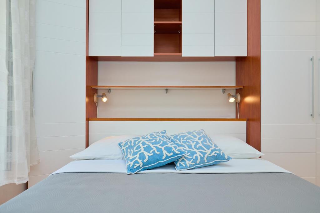 Postel nebo postele na pokoji v ubytování Apartment Furmus A26