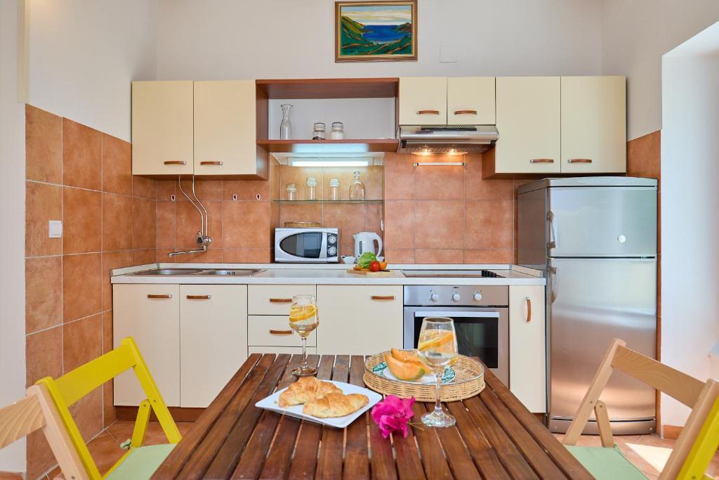 Kuchyň nebo kuchyňský kout v ubytování Apartment Furmus A26