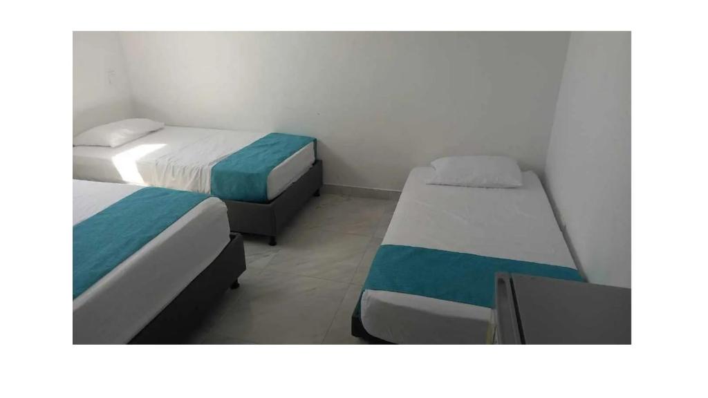 Postel nebo postele na pokoji v ubytování Sky view hotel tolu
