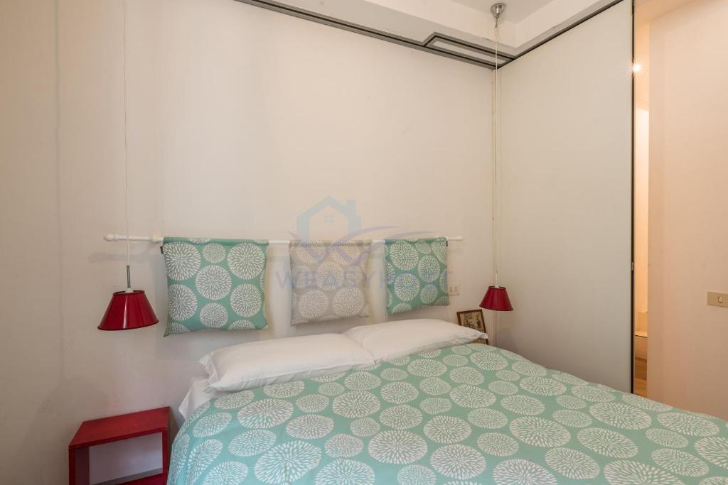 Posteľ alebo postele v izbe v ubytovaní Cozy Entire Apt Close to Piazza Trilussa