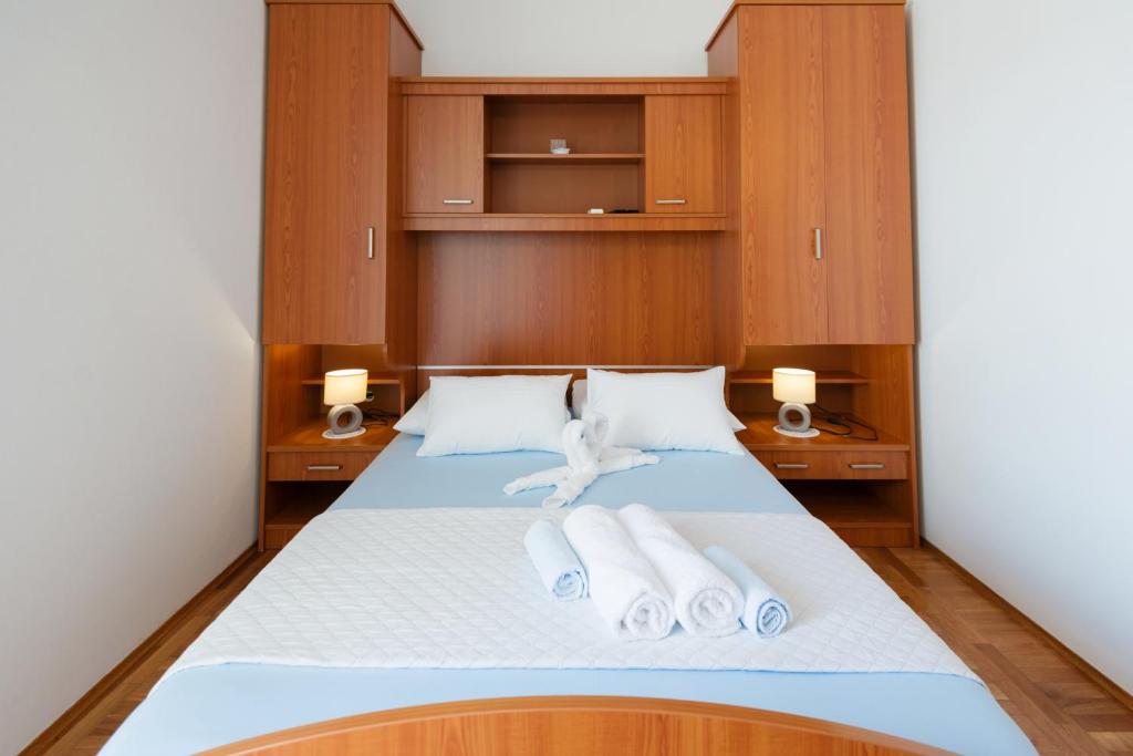 Postel nebo postele na pokoji v ubytování Guesthouse Sanela