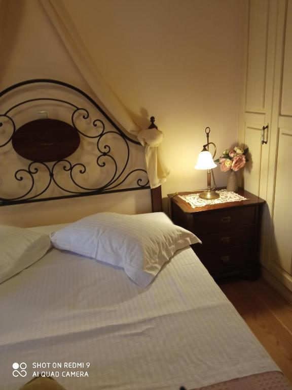 Postel nebo postele na pokoji v ubytování Valentini Guesthouse