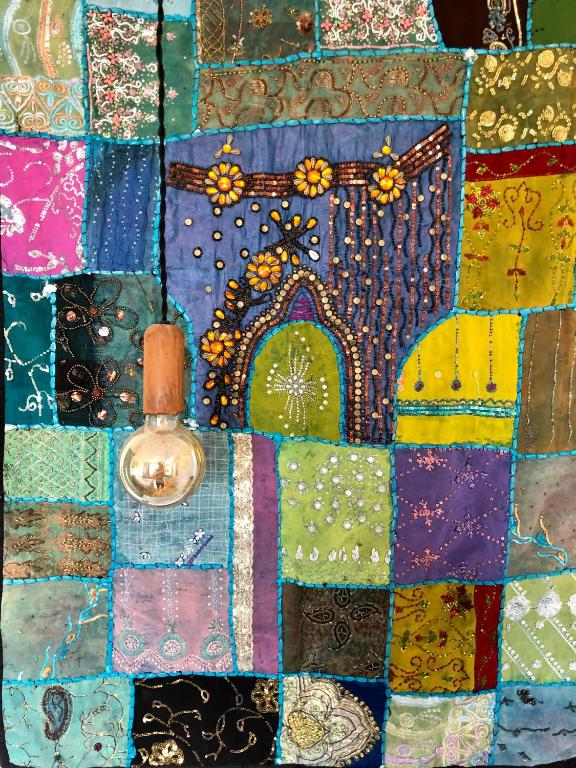 a close up of a quilt with a castle on it at City room in Alkmaar