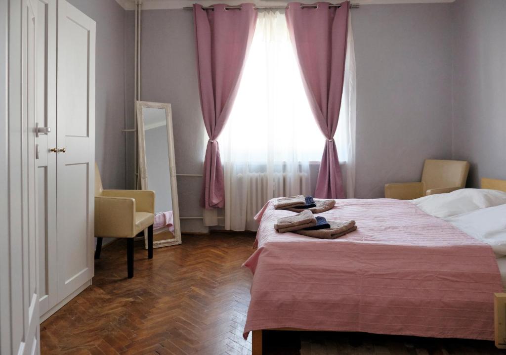Postel nebo postele na pokoji v ubytování Jagielonka