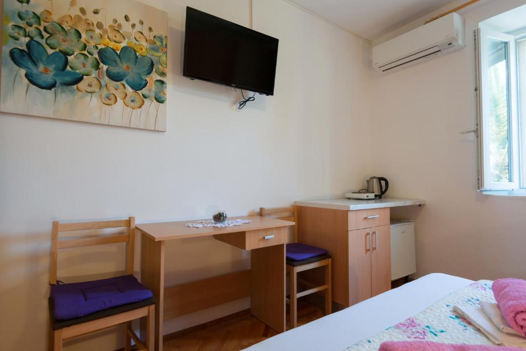 TV a/nebo společenská místnost v ubytování Guesthouse Pavla
