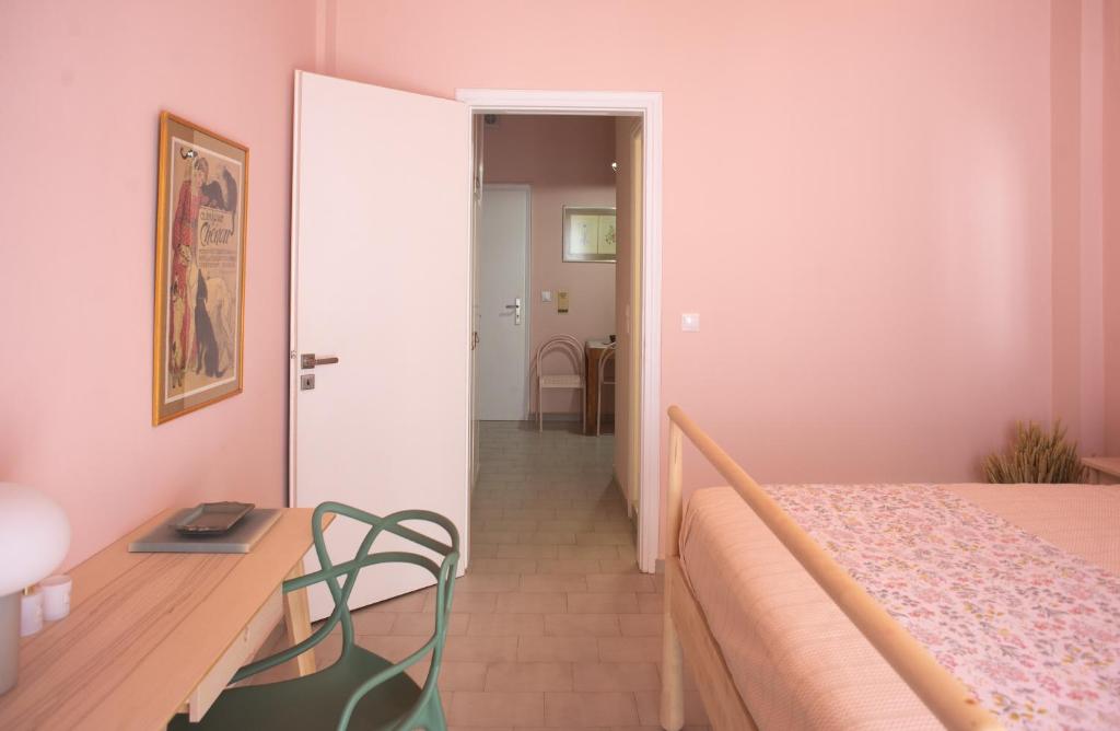 Postel nebo postele na pokoji v ubytování Ann's Apartment