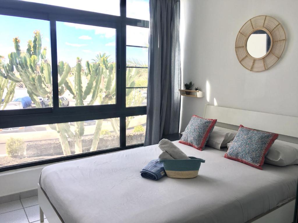 Postel nebo postele na pokoji v ubytování Cozzy Apartment con vista al mar