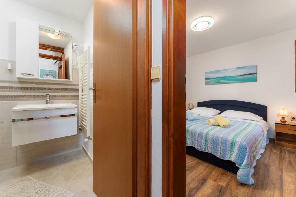 Postel nebo postele na pokoji v ubytování Alda-app