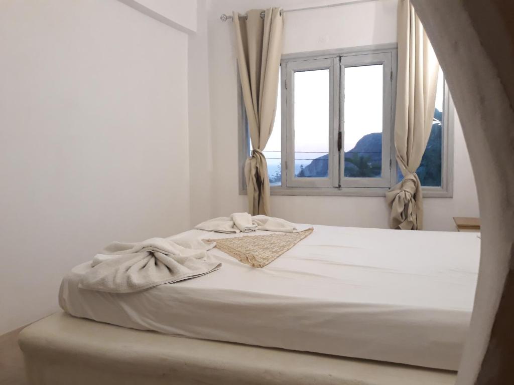 Postel nebo postele na pokoji v ubytování Sunset Suites 'Annada