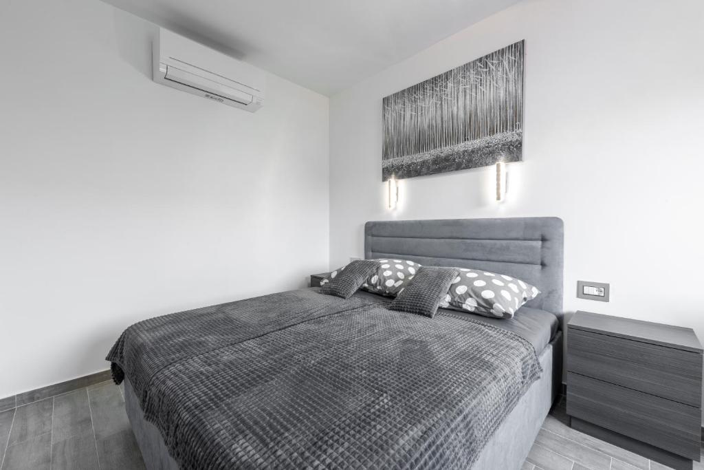 Postel nebo postele na pokoji v ubytování Paladium Exclusive Apartment